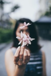 Asian woman with flower